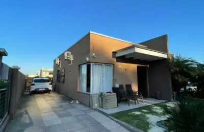 Casa 02 dorm à venda no bairro capão novo - 3 vagas de garagem