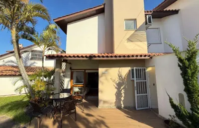 Sobrado 02 dorm à venda no bairro capão novo com 75 m² de área privativa - 2 vagas de garagem