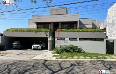 Linda casa em condomínio fechado sao jose floripa sc com 5 quartos e 6 banheiros à venda