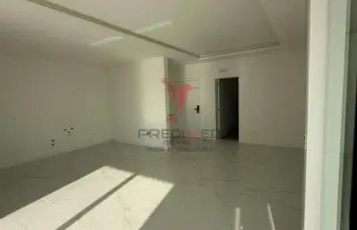 Apartamento de alto padrão com 3 suites e duas vagas de garagem, sacada,na meia praia