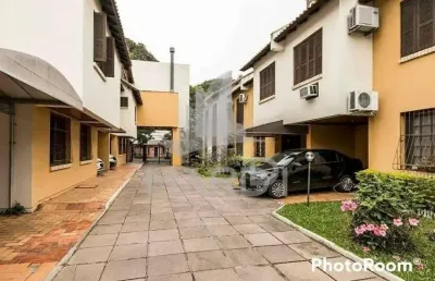 Casa em condomínio fechado com 3 quartos à venda na rua dona zulmira, 376, cavalhada, porto alegre por r$ 410.000