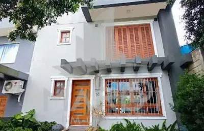 Casa em condomínio fechado com 4 quartos à venda na rua joão do couto, 201, belém velho, porto alegre por r$ 710.000
