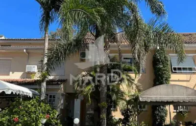 Casa em condomínio fechado com 3 quartos à venda na rua doutor barcelos, 2317, tristeza, porto alegre por r$ 690.000