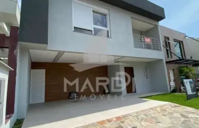 Casa em condomínio fechado com 3 quartos à venda na rua ivo walter kern, 599, hípica, porto alegre por r$ 1.100.000