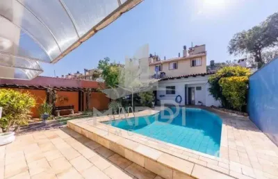 Casa com 3 quartos à venda na avenida arlindo pasqualini, 72, jardim isabel, porto alegre por r$ 980.000