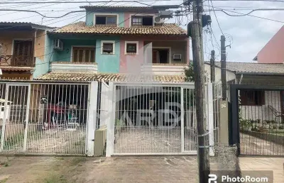 Casa com 2 quartos à venda na rua james bocacio, 96, hípica, porto alegre por r$ 550.000