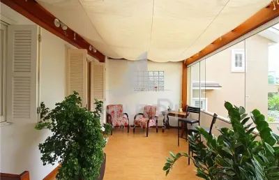 Casa com 3 quartos à venda na rua felizardo de farias, 185, medianeira, porto alegre por r$ 615.000
