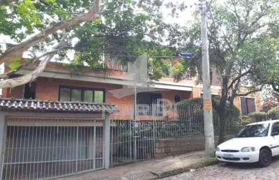 Casa com 4 quartos à venda na rua fonseca guimarães, 34, medianeira, porto alegre por r$ 1.600.000