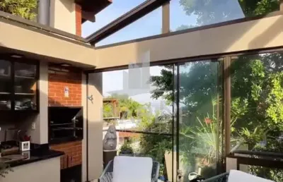 Casa em condomínio fechado com 3 quartos à venda na rua doutor possidônio cunha, 265, vila assunção, porto alegre por r$ 1.200.000
