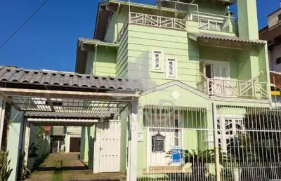 Casa com 4 quartos à venda na rua folha da tarde, 49, cristal, porto alegre por r$ 1.635.000