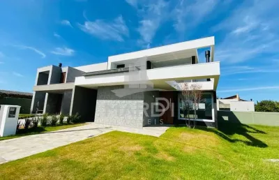 Casa em condomínio fechado com 4 quartos à venda na rua rio camisas, 101, centro, xangri-lá por r$ 2.300.000