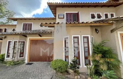 Casa em condomínio fechado com 3 quartos à venda na travessa alfredo magalhães, 128, ipanema, porto alegre por r$ 599.000