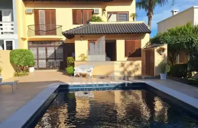 Casa com 4 quartos à venda na rua doutor joão palombini, 95, ipanema, porto alegre por r$ 1.915.000