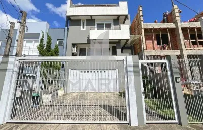 Casa com 3 quartos à venda na rua ivo walter kern, 230, hípica, porto alegre por r$ 930.000