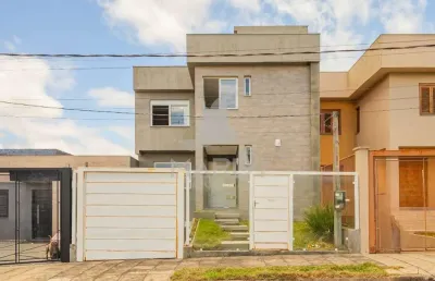 Casa com 3 quartos à venda na rua maria lídia magliani, 34, campo novo, porto alegre por r$ 719.000