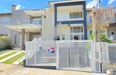 Casa em condomínio fechado com 3 quartos à venda na rua fabiana kila de ávila, 103, hípica, porto alegre por r$ 799.000