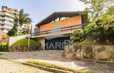 Casa com 4 quartos à venda na travessa java, 76, jardim lindóia, porto alegre por r$ 1.095.000