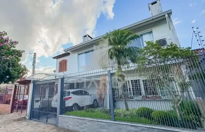 Casa com 4 quartos à venda na rua pedro waine, 194, santa maria goretti, porto alegre por r$ 835.000