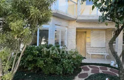 Casa com 4 quartos à venda na rua ancara, 381, guarujá, porto alegre por r$ 890.000