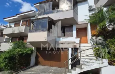 Casa em condomínio fechado com 3 quartos à venda na avenida jacuí, 740, cristal, porto alegre por r$ 1.080.000