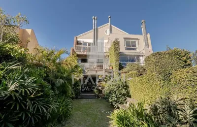 Casa com 3 quartos à venda na avenida general barreto viana, 618, chácara das pedras, porto alegre por r$ 1.500.000