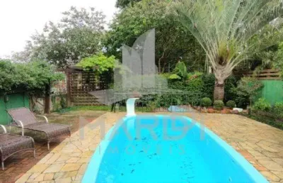 Casa em condomínio fechado com 3 quartos à venda na avenida edgar pires de castro, 540, hípica, porto alegre por r$ 999.990