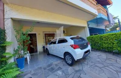 Casa com 4 quartos à venda na rua doutor pio ângelo, 60, ipanema, porto alegre por r$ 549.000