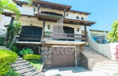 Casa com 5 quartos à venda na rua afonso álvares, 49, tristeza, porto alegre por r$ 2.700.000