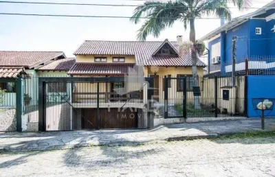 Casa com 3 quartos à venda na rua professor leonardo tochtrop, 19, ipanema, porto alegre por r$ 1.200.000