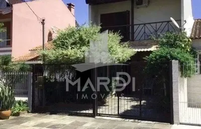 Casa com 3 quartos à venda na rua vacaria, 115, hípica, porto alegre por r$ 430.000