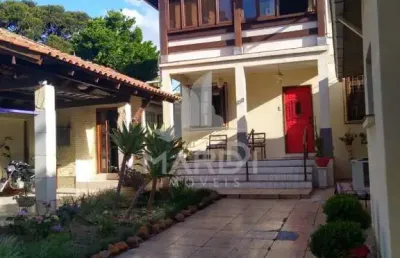 Casa com 4 quartos à venda na rua osorio de lima prestes, 150, tristeza, porto alegre por r$ 1.349.000