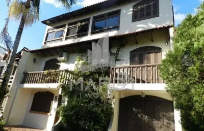 Casa em condomínio fechado com 5 quartos à venda na avenida otto niemeyer, 1199, tristeza, porto alegre por r$ 595.000