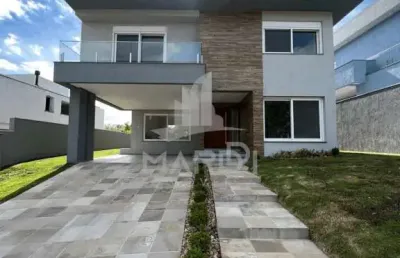 Casa em condomínio fechado com 4 quartos à venda na estrada das três meninas, 1501, vila nova, porto alegre por r$ 2.150.000
