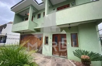 Casa em condomínio fechado com 3 quartos à venda na rua louro, 34, hípica, porto alegre por r$ 680.000