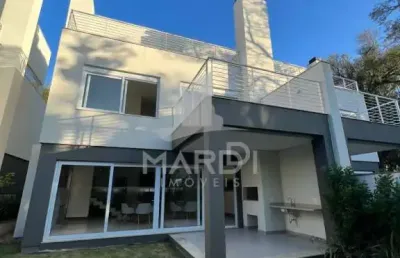 Casa em condomínio fechado com 3 quartos à venda na rua doutor ney de castilhos ferreira, 300, pedra redonda, porto alegre por r$ 3.150.000