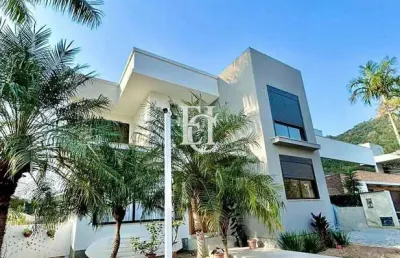 Casa nova à venda em condomínio fechado na cachoeira do bom jesus – a poucos metros da praia