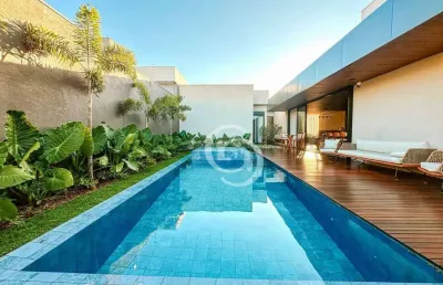 Casa com 3 suítes inteiramente mobiliada e decorada por r$ 3.500.000 - tropical ii - cascavel/pr