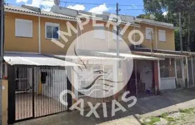 Sobrado entrada individual dois dormitórios, garagem coberta bairro santa catarina , caxias do sul/rs.