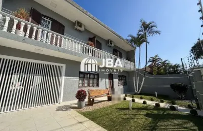 Casa com 5 quartos à venda na rua câmara júnior, 906, jardim das américas, curitiba, 245 m2 por r$ 1.690.000