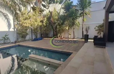 Sobrado com 4 dormitórios, 351 m² - venda por r$ 2.800.000,00 ou aluguel por r$ 15.000,00/mês - condomínio residencial jaguary - são josé dos campos/sp