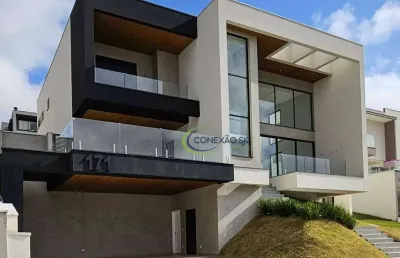 Sobrado com 4 dormitórios à venda, 415 m² por r$ 4.500.000,00 - condomínio reserva do paratehy - são josé dos campos/sp