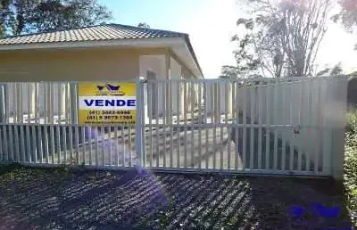 Casa geminada no condomínio ilhas belas ? averbada e apenas 3 quadras do mar em guaratuba!