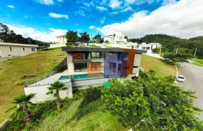 Casa alto padrão em condomínio 650m² com 04 suítes e 6 vagas - vende-se em alphavile
