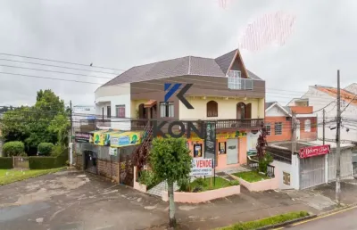 Sobrado a venda no xaxim ideal para investimento, residencial/comercial.