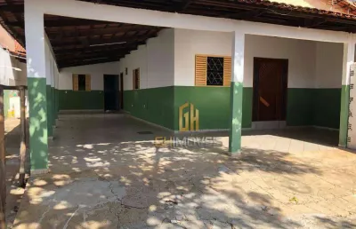 Casa e barracão em lote com 400m² no jardim america