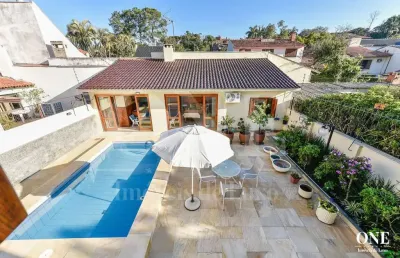 Casa em condomínio fechado com 5 quartos à venda na avenida pereira passos, 239, vila assunção, porto alegre por r$ 2.450.000