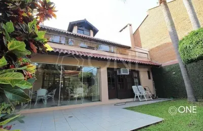 Casa em condomínio fechado com 4 quartos à venda na rua doutor barbosa gonçalves, 610, chácara das pedras, porto alegre por r$ 2.990.000