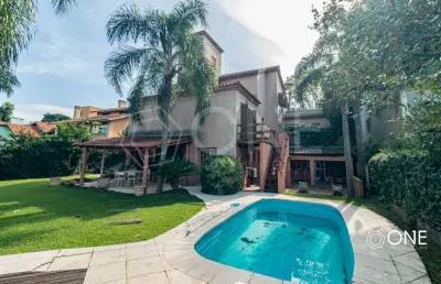 Casa em condomínio fechado com 4 quartos à venda na avenida firmino octávio bimbi, 255, cavalhada, porto alegre por r$ 2.190.000