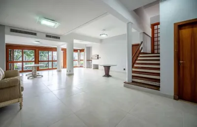 Casa em condomínio fechado com 6 quartos à venda na rua gustavo schmidt, 277, três figueiras, porto alegre por r$ 2.900.000