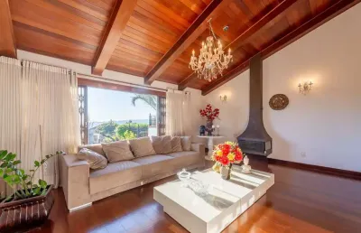 Casa em condomínio fechado com 4 quartos à venda na rua joão bastian, 79, três figueiras, porto alegre por r$ 1.990.000